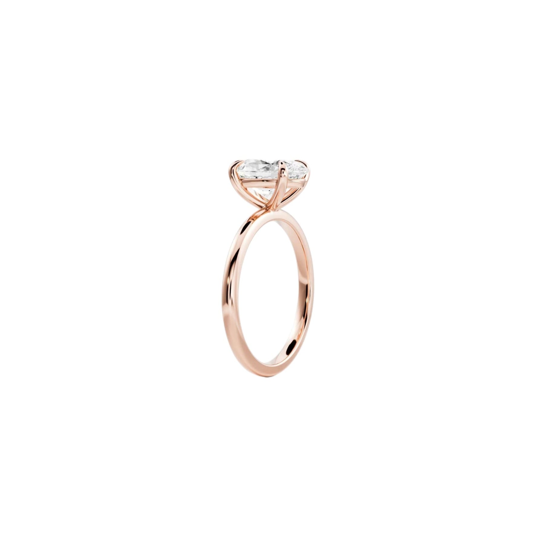 Rose gold ring with a diamond on a white background